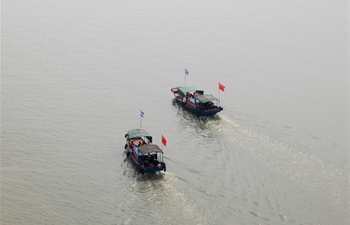 Auxiliary brigade helps with preservation of cowfish in E China's Jiangxi