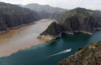 Scenery of two rivers meeting in Liujiaxia Reservoir in China's Gansu