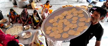 Kashmiri people prepares holy food for devotees in Jammu