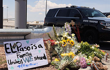People mourn for mass shooting victims in Texas, Ohio