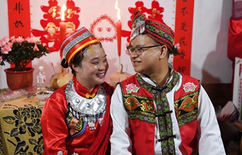 In pics: delayed wedding ceremony for couple devoted in poverty alleviation