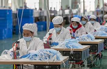 Mask production gets into high gear in company in Shanghai