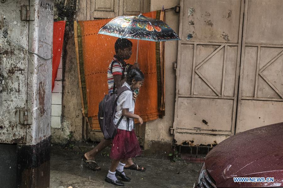 INDIA-KOLKATA-WEATHER-RAIN