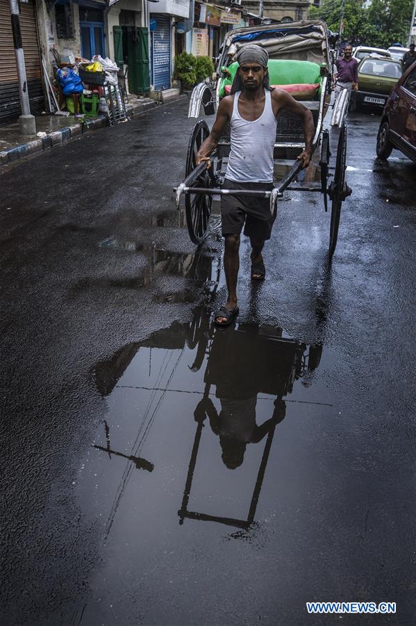 INDIA-KOLKATA-WEATHER-RAIN