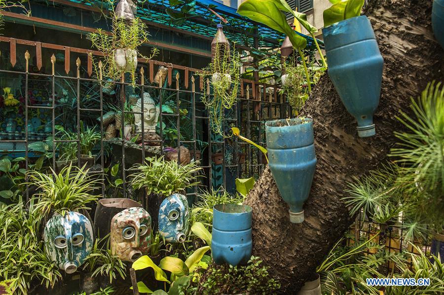 INDIA-KOLKATA-GARDEN-REUSED WASTE