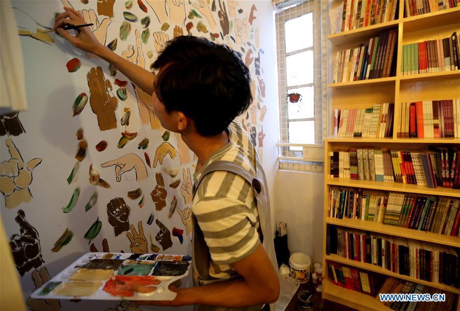 MYANMAR-YANGON-BOOK CAFE-SIGN-LANGUAGE