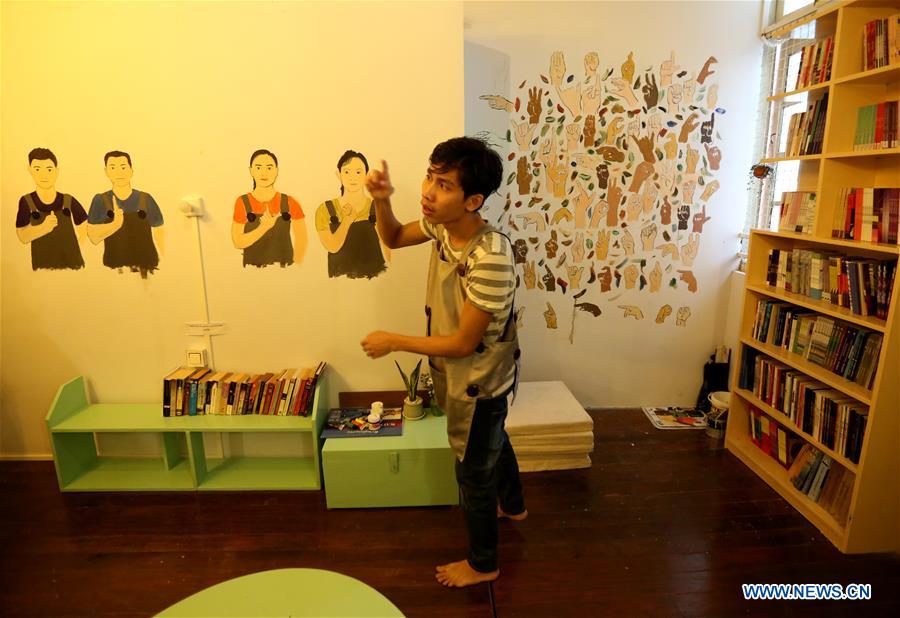 MYANMAR-YANGON-BOOK CAFE-SIGN-LANGUAGE