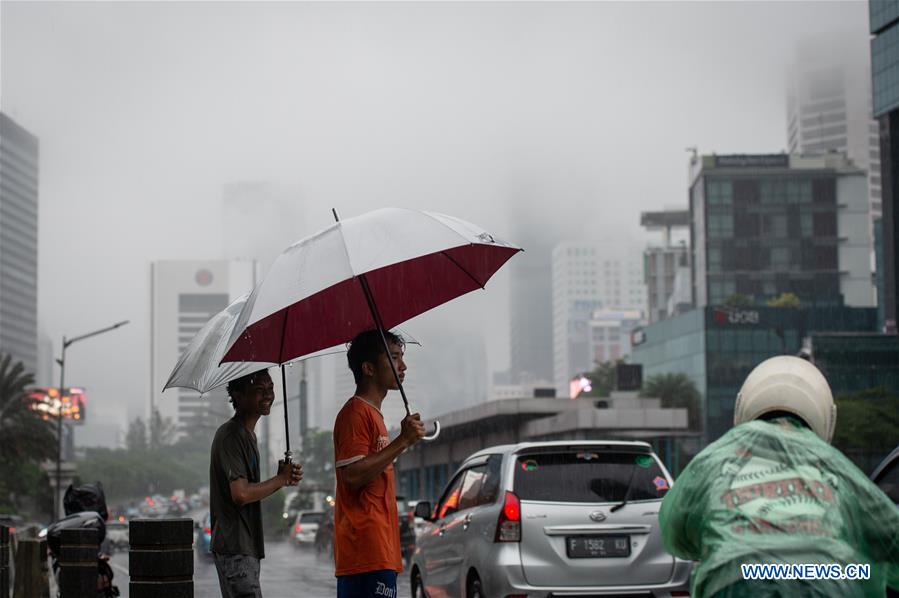 INDONESIA-JAKARTA-WEATHER-FOG AND RAIN