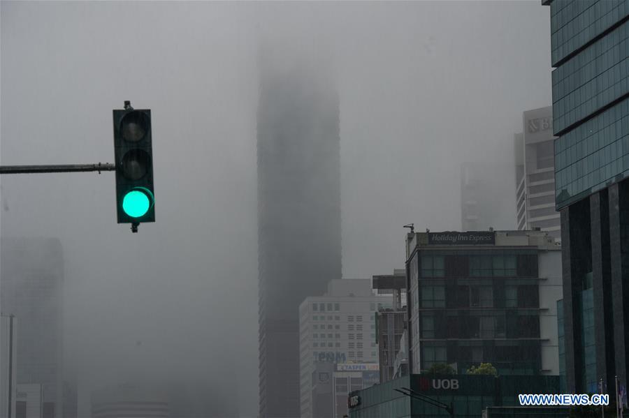INDONESIA-JAKARTA-WEATHER-FOG AND RAIN