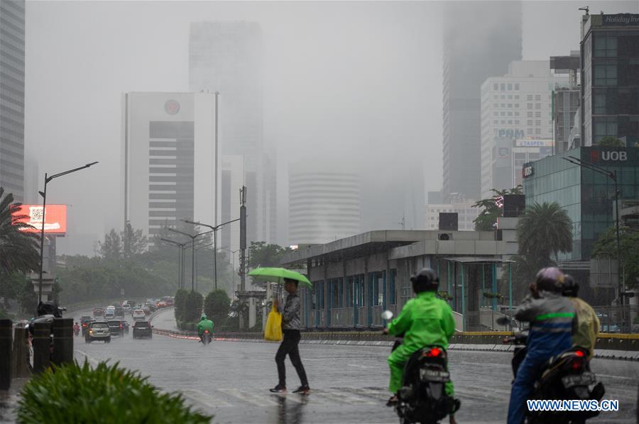 INDONESIA-JAKARTA-WEATHER-FOG AND RAIN