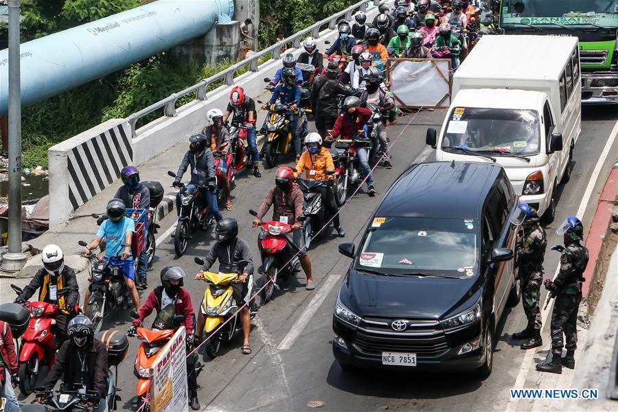 PHILIPPINES-LAS PINAS-COVID-19-COMMUNITY QUARANTINE CHECKPOINT