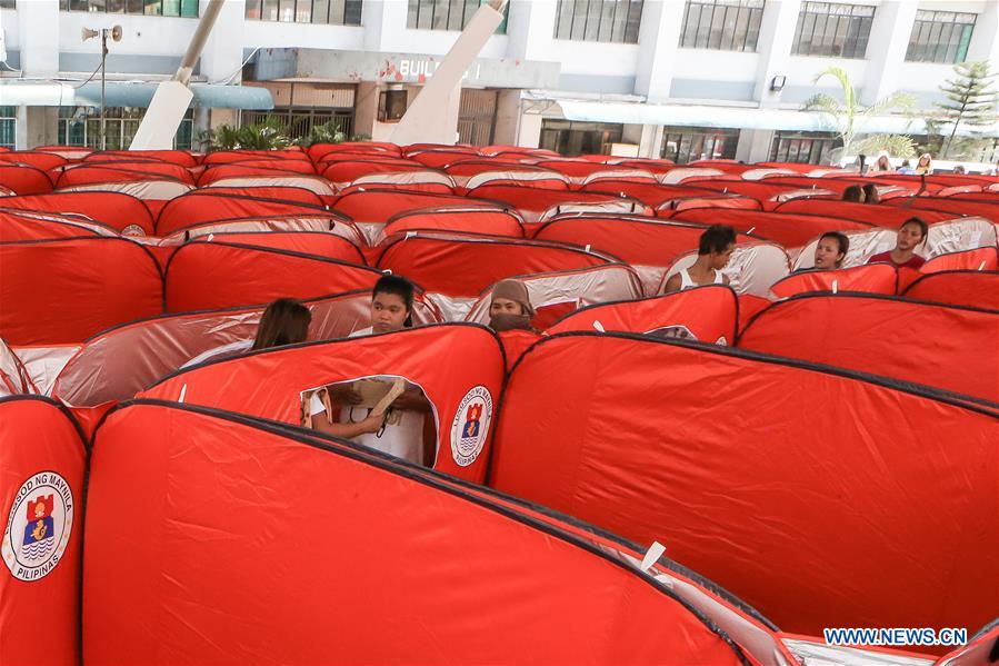PHILIPPINES-MANILA-SLUM AREA-FIRE-TENTS
