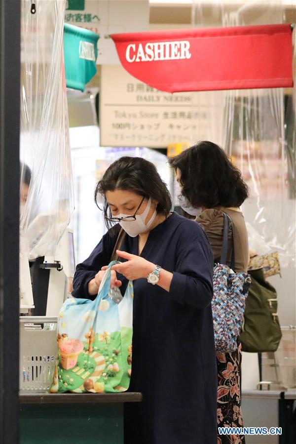 Retail stores in Japan start charging shoppers for plastic bags