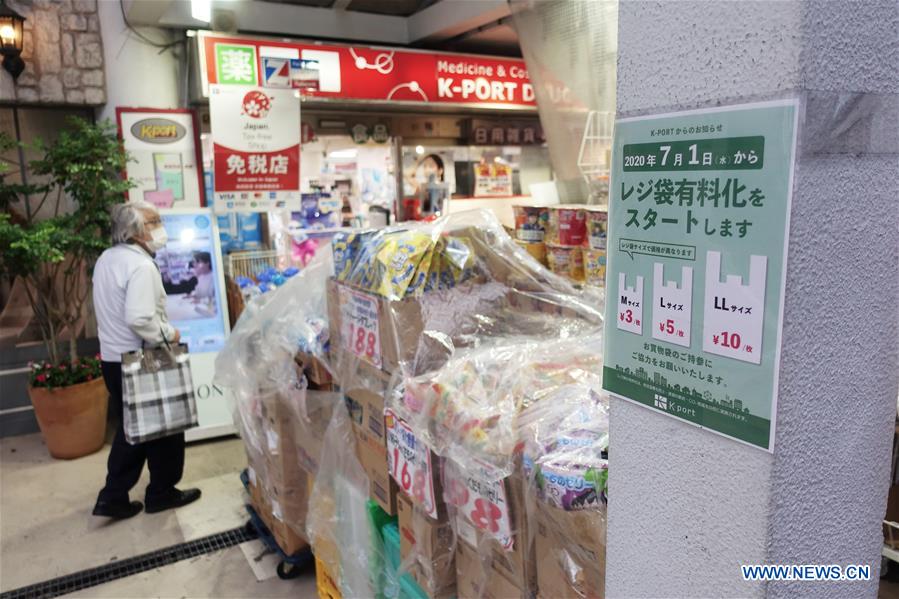 Retail stores in Japan start charging shoppers for plastic bags