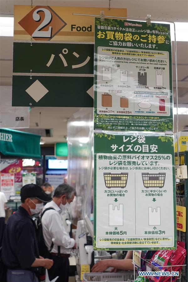 Retail stores in Japan start charging shoppers for plastic bags