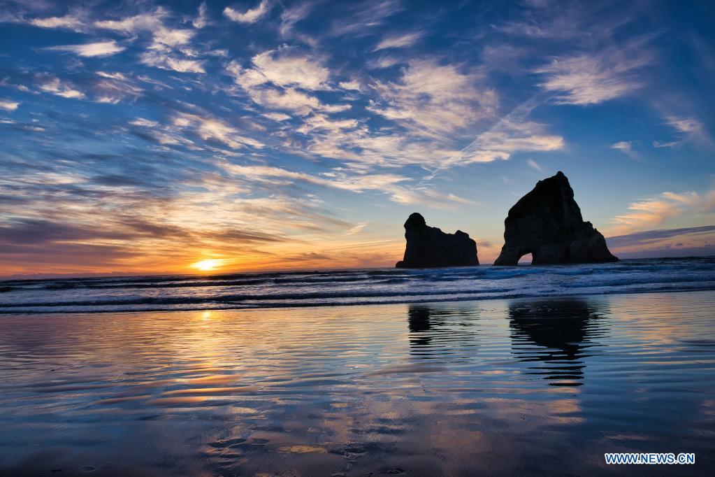 Scenery of Wharariki Beach of Golden Bay in New Zealand Xinhua