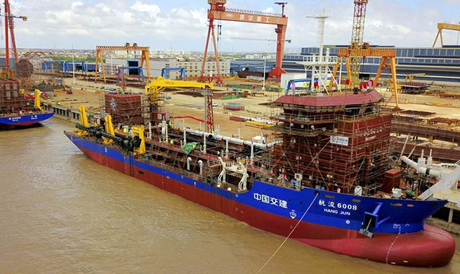 Two dredging vessels launched in east China's Jiangsu