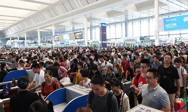 China's holiday to see peak in return trips on Sunday