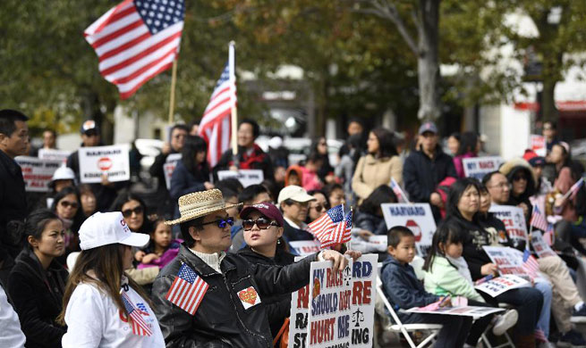 Hundreds of Asian Americans rally in Boston to back lawsuit over Harvard admissions