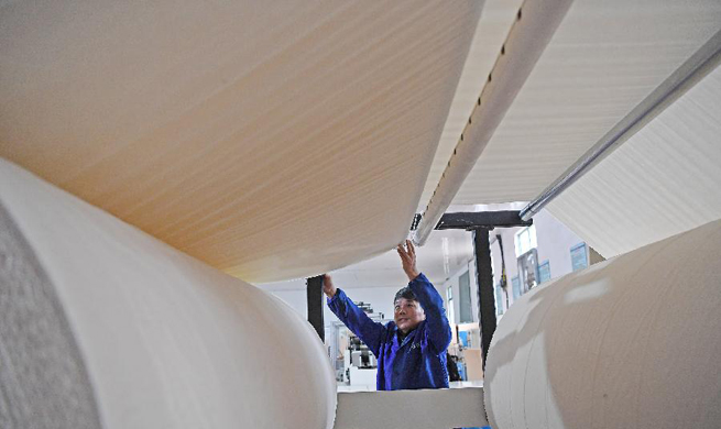 East China county makes paper with recyclable bamboo materials