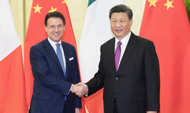 Xi meets Italian prime minister