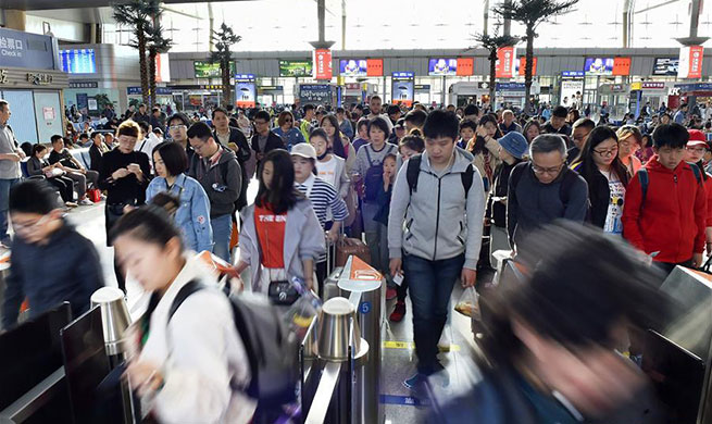 Railway sees passenger number rise as Labor Day holiday begins in China