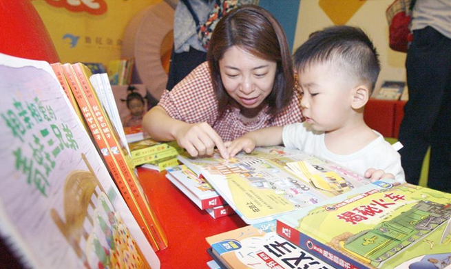 Parent-child reading promoted at early childhood education center in Beijing
