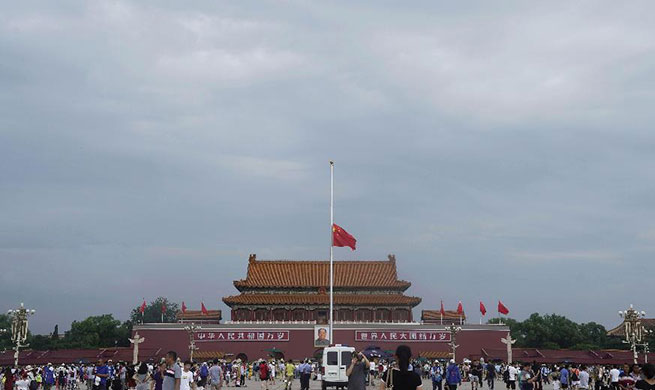 Chinese national flag flies at half-mast to mourn for late Chinese leader Li Peng at Tian'anmen Square
