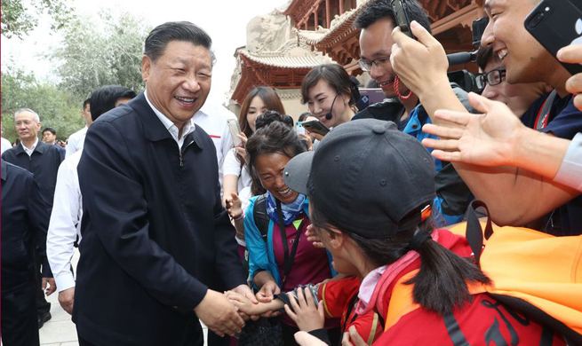 Xi highlights poverty relief, high-quality development, environmental protection