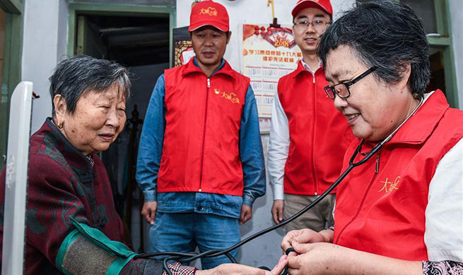 Teams of volunteers provide different services in community of Yuyao, China's Zhejiang