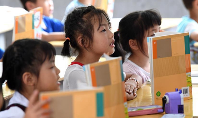 Pic story: first primary school built under Project Hope in China