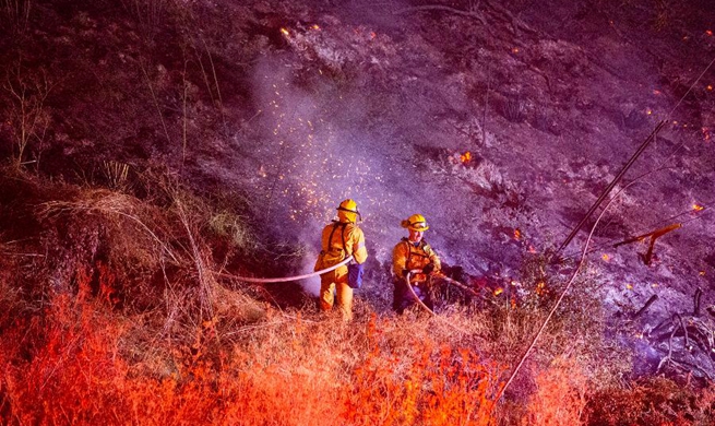 Thousands evacuated in Los Angeles over fast-moving wildfire near Getty Center