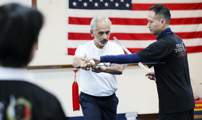 Feature: Former world champion brings Tai Chi into New Yorkers' life