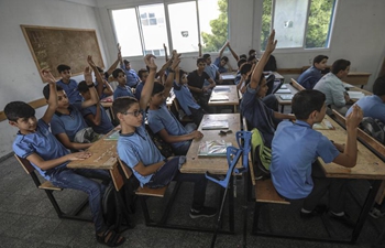 In pics: Palestinian refugee students in northern Gaza Strip