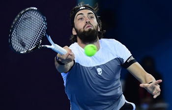 In pics: men's singles second round at China Open