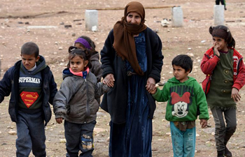 Families return to their homes in government-held areas in northern Syria