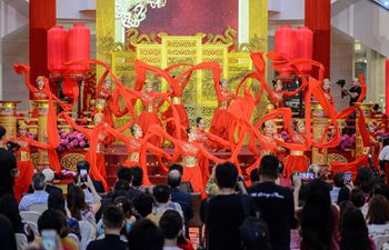 People visit Chinese New Year decoration "A Regal Celebration" in Kuala Lumpur, Malaysia
