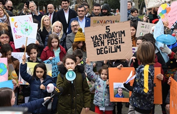 Turkish pupils attend rally to appeal for action on climate change in Istanbul