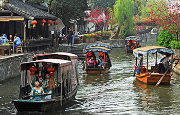Tourists visit Nanxun Town, E China's Zhejiang