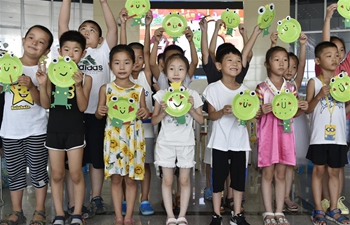 Various activities held in Hebei's library to enrich children's lives during summer vacation