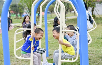 People have fun at Nantian Lake scenic area in Chongqing