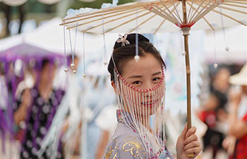 People celebrate Qixi festival in China's Yunnan