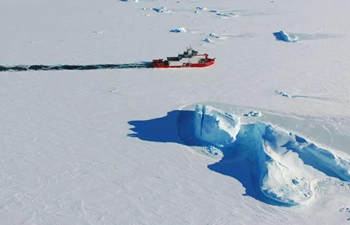 China's polar icebreaker Xuelong 2 breaks ice in waters in Antarctica