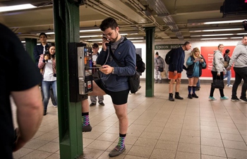 People take part in annual No Pants Subway Ride event in New York