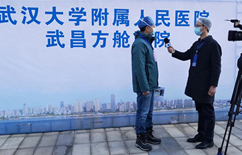 Xinhua journalists busy covering war against epidemic on frontline in Hubei