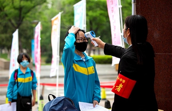Students in final year of junior high schools in Hebei return to campus