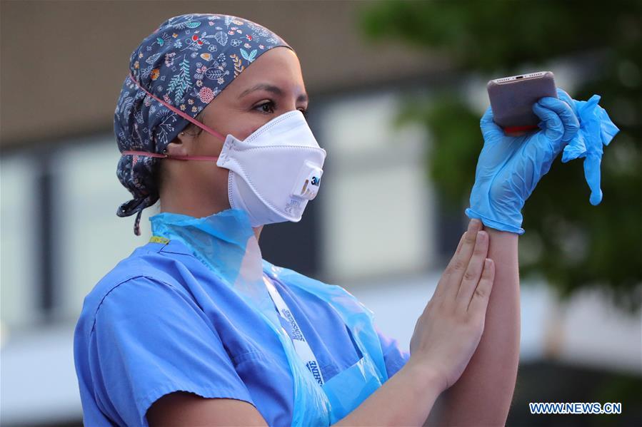 BRITAIN-READING-COVID-19-CLAP FOR OUR CARERS