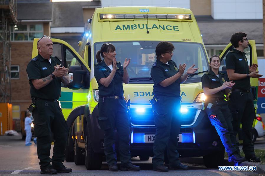 BRITAIN-READING-COVID-19-CLAP FOR OUR CARERS
