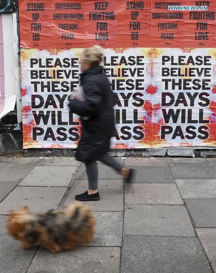 BRITAIN-LONDON-COVID-19-POSTER