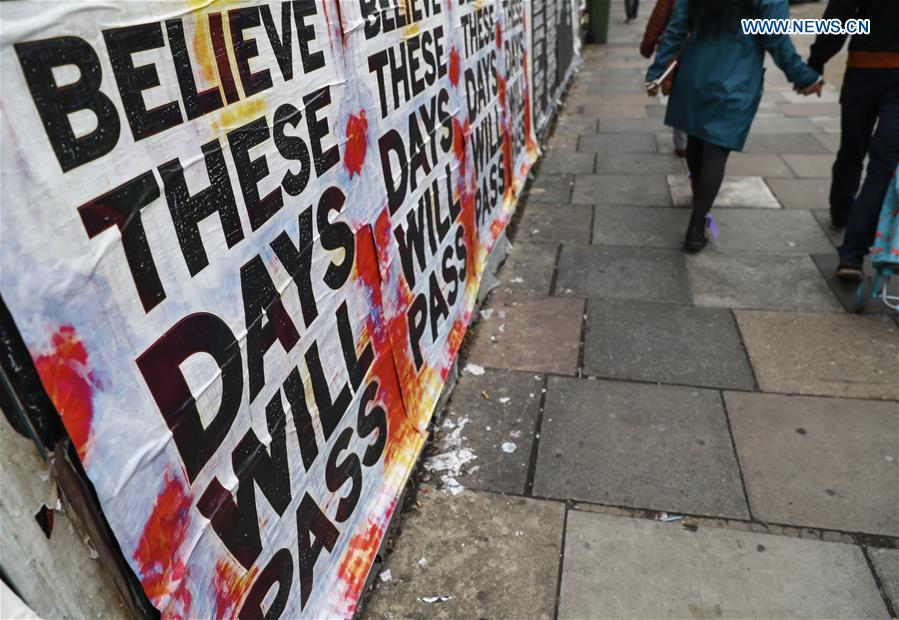 BRITAIN-LONDON-COVID-19-POSTER